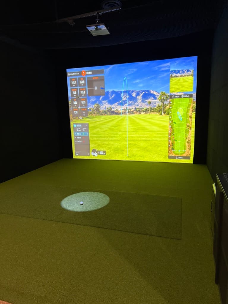 TrackMan shot data on the bay screen